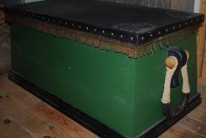 Green wooden sailor's chest complete with becket rope handles and wooden knobs